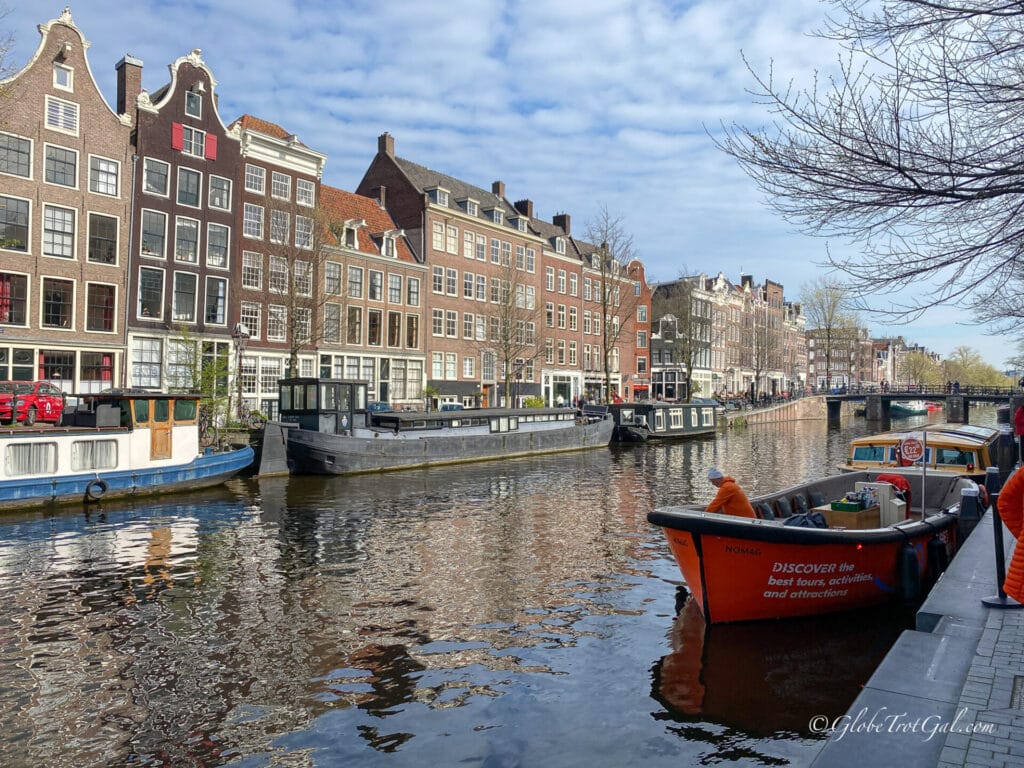 A classic canal view in Amsterdam, Netherlands, one of the safest European cities for solo female travelers.