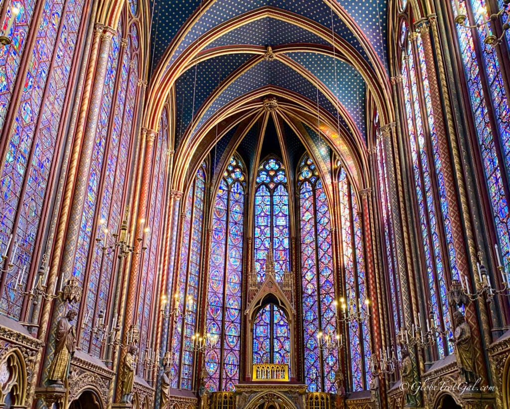 Stunning stained glass windows in Sainte Chappelle, an essential stop on a 3 day Paris itinerary for first time visitors.