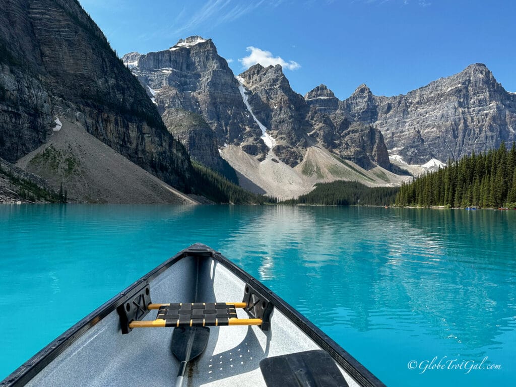 Solo canoe excursion in Moraine Lake, Alberta, Canada