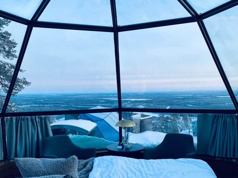 Inside a glass igloo at Levin Iglut, one of the best glass igloo hotels in Finnish Lapland