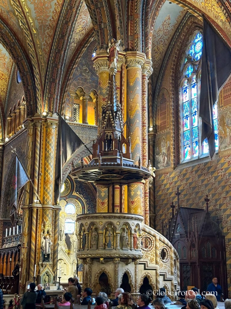 Intricately painted interior of Matthias Church aka Church of Our Lady of Buda Castle in Budapest, Hungary