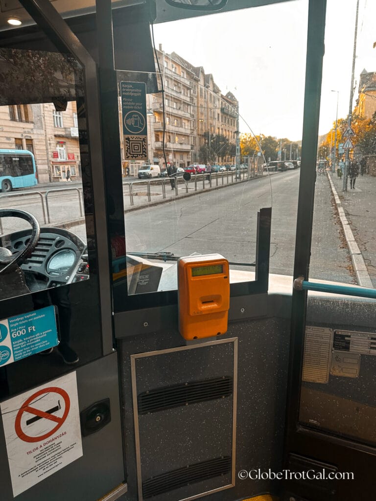 Ticket validating machine inside a Budapest Hungary city bus.