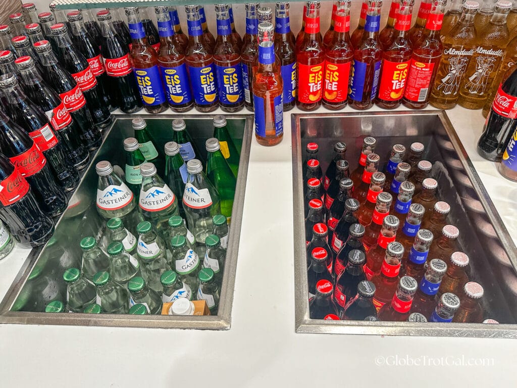 Sodas and waters in glass bottles in chilled bins in the OBB Lounge in Wien Hbf