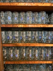 Shelves of steins at the Hofbrauhaus in Munich Germany