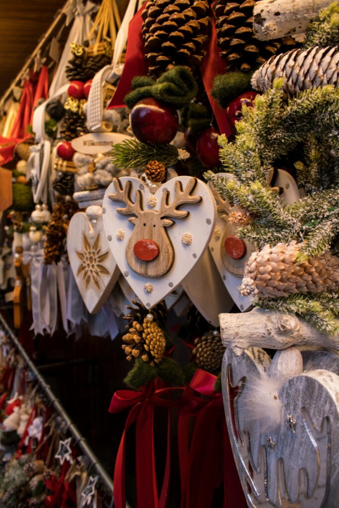 Colorful Christmas decorations on display at a market in Munich, Germany, featuring festive ornaments and winter charm.